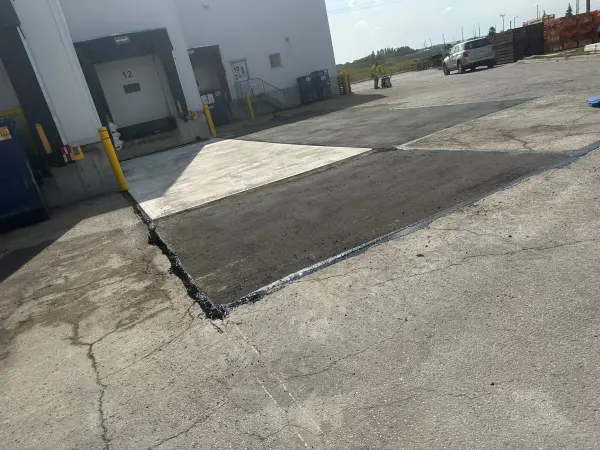 Asphalt maintenance in a parking area