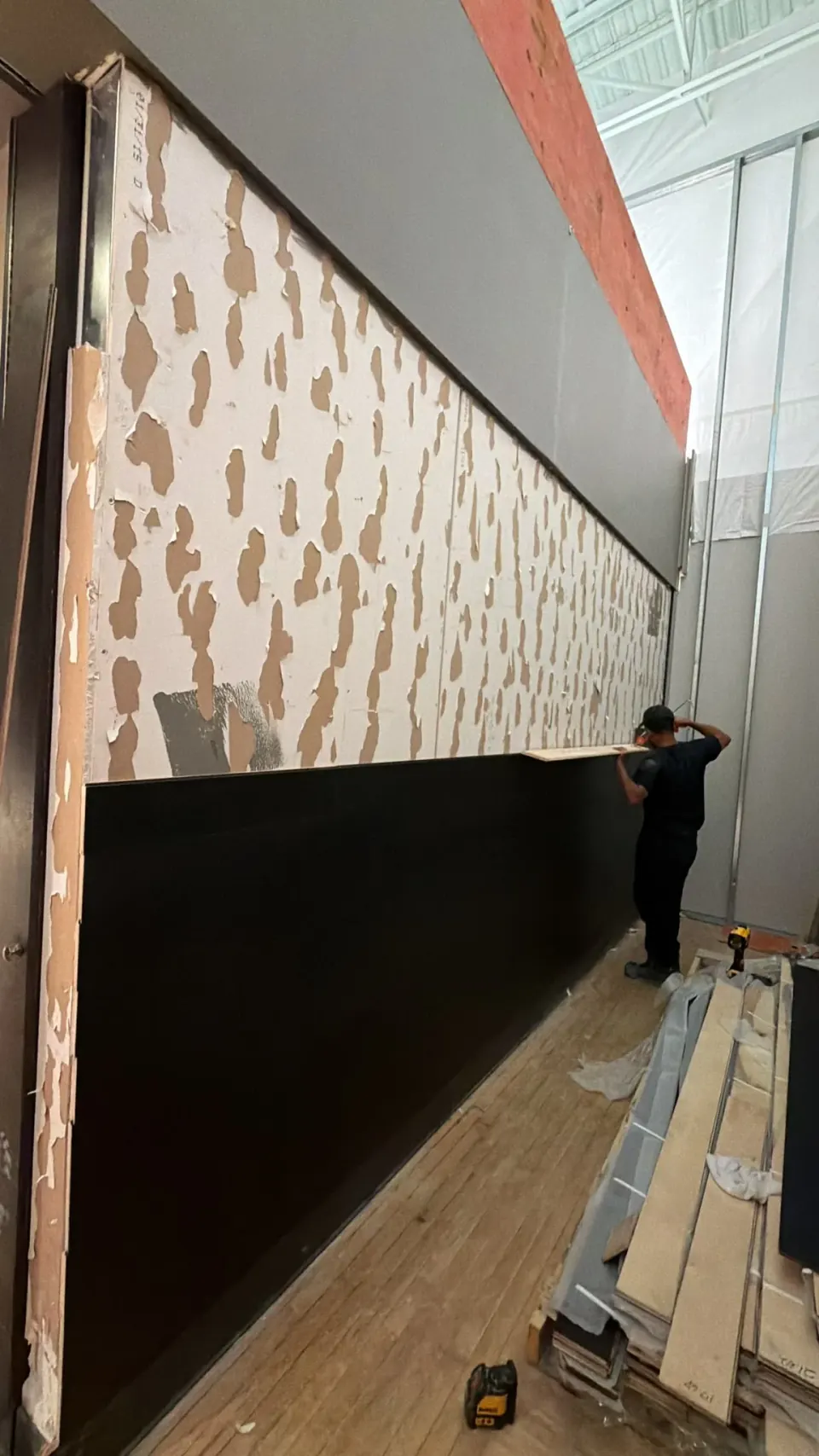 Interior commercial wall during cladding work